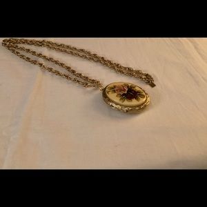 Vintage style Locket with flower design.